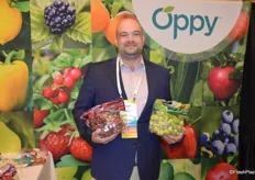 Peter Cole with Oppy shows California-grown red and green seedless grapes.